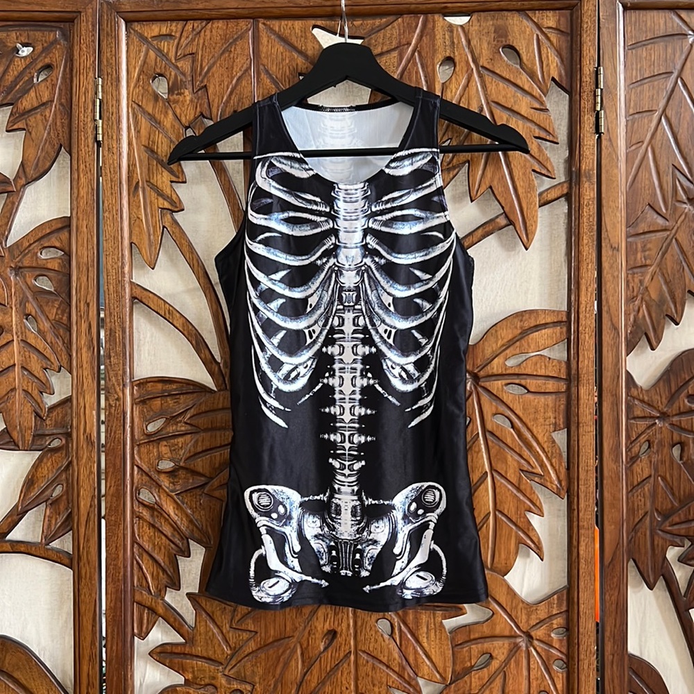 Skeleton tank top. Athletic material, stretchy. Fits like an XS or dress size 4
